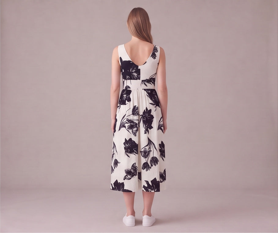 Beyaz büyük çiçek desenli göğüs altı bantlı uzun kadın elbise - 27. görsel